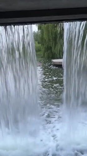 Park waterfall documented by witnesses in Minsk at dusk