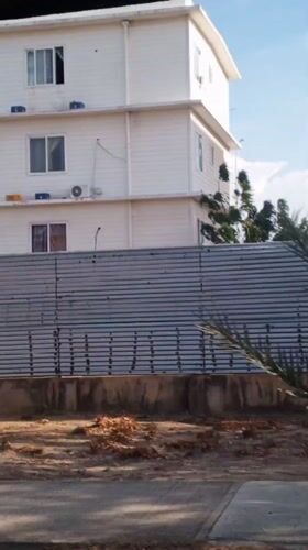 Building filmed from moving vehicle in Porlamar, Venezuela