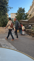 Street scene captured in Toulon during clear afternoon