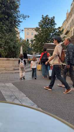 Street scene captured in Toulon during clear afternoon