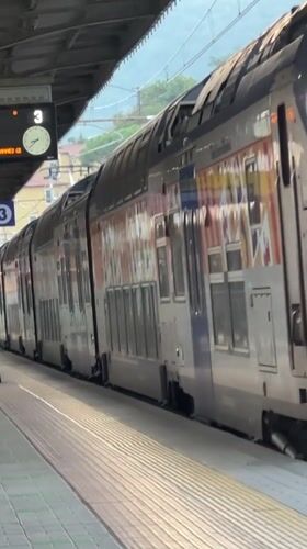 Double-decker train stopped at Ventimiglia station