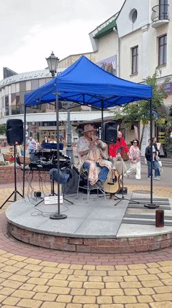 Street performance with music and dancing in Brest