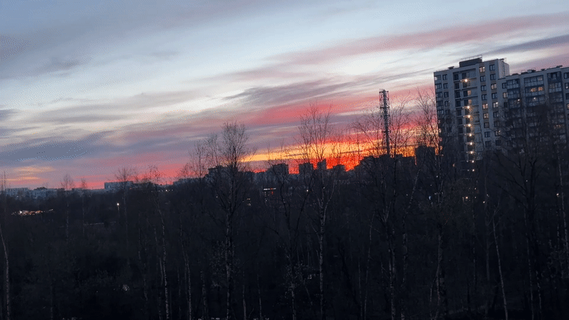 Resident documents Kudrovo cityscape and anime art during evening hours