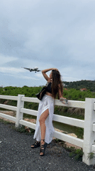 Woman in traditional attire observed in Baan Bang Rak, Thailand