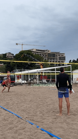 Early morning beach volleyball game captured in Boreti, Montenegro