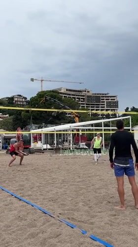 Early morning beach volleyball game captured in Boreti, Montenegro