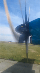 Airport tarmac activity: turboprops, a Jet2 737, and boarding