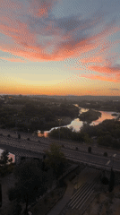 Sunset over Toledo's medieval bridge and Tagus River