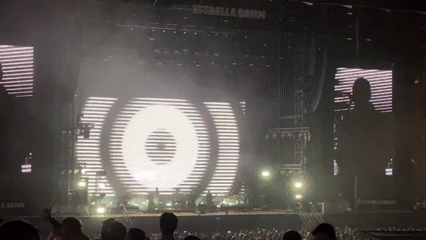 Outdoor concert with large screens and crowds in Porto