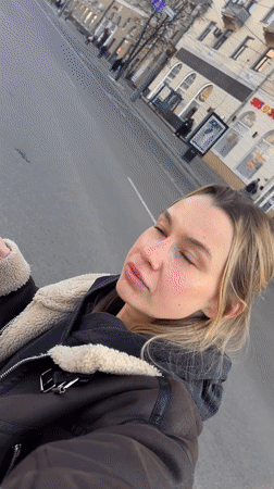 Woman films selfie video in Voronezh urban area