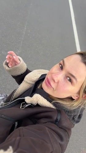 Woman films selfie video in Voronezh urban area
