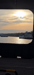 Ferry crossing and coastal road drive at sunset