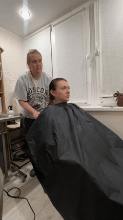 Hair styling session documented in Moscow salon