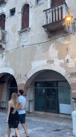Evening stroll through a Vittorio Veneto piazza