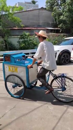 Nha Trang street life: flags, food carts, murals, and city texture