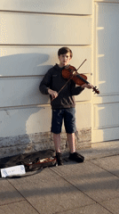 Violin busking and vintage jewelry at a Saint Petersburg street scene