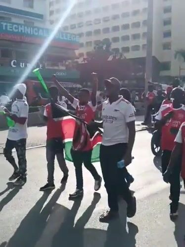 Arsenal fans celebrate in Nairobi streets with flags, vuvuzelas