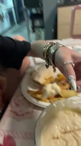 Casual meal of potato wedges and pita documented in Raanana