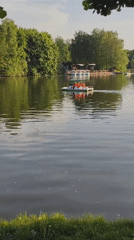 Tranquil lake scene with boats captured in Moscow