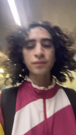 Commuter travels through Buenos Aires subway stations during evening hours