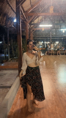 Woman takes mirror selfies in Phu Thuy Ward restaurant
