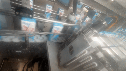 Automated carton packaging line running at a Riga factory