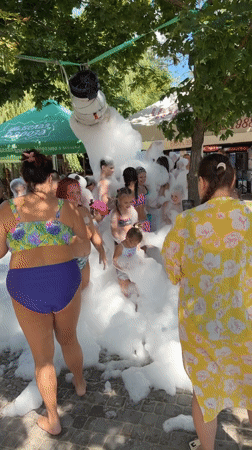 Foam party and beach day along the Teteriv River in Marianivka