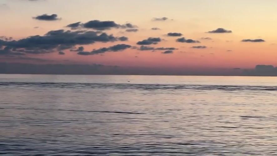 Sunset beach activities captured along Black Sea coast in Sirius