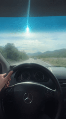 Daytime highway drive through green countryside near Barutana, Montenegro