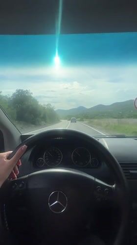 Daytime highway drive through green countryside near Barutana, Montenegro