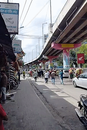 Street crowd and car showroom scenes from Dhaka