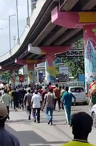 Street crowd and car showroom scenes from Dhaka