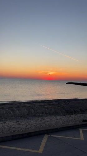Sunset captured over Black Sea beach in Pomorie, Bulgaria