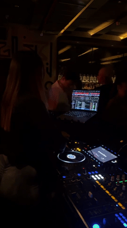 DJ performs at Tel-Aviv nightclub during evening hours