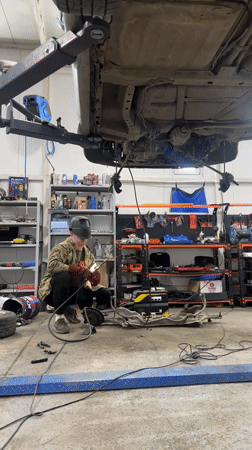 Undercarriage welding in a Blagoveshchensk garage, sparks flying