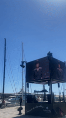 Outdoor stage setup observed at Barcelona marina waterfront