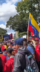 Political rally draws crowds with Venezuelan flags in Caracas