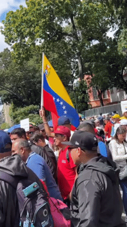 Political rally draws crowds with Venezuelan flags in Caracas