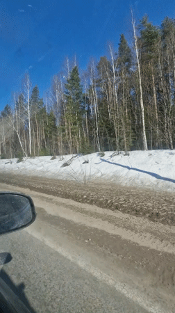 Driver records muddy, snow-covered road conditions in Chaykovsky