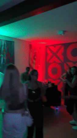 Late-night party with DJ and dancers captured in São Paulo