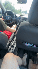 Car interior scene with driver and passenger in Varna