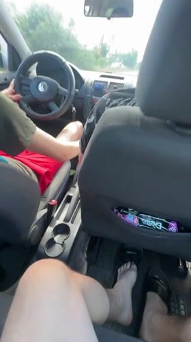 Car interior scene with driver and passenger in Varna