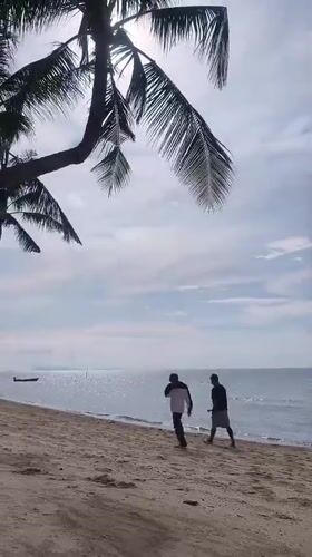 Morning beach life captured in Baan Tai, Thailand
