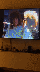 TV displays music video content in València home