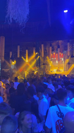 Thai nightlife venues bustling with crowds during evening hours