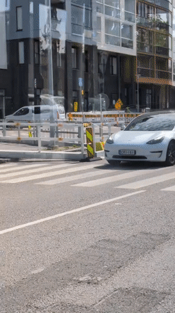 Vehicles navigate construction zone in Vantaa, Finland