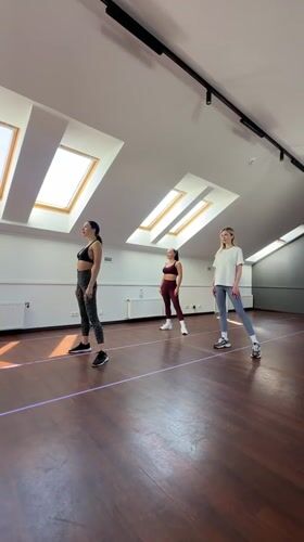 Three women perform synchronized dance in Riga studio