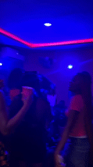 Nightclub gathering with dancing and music in Durimi, Nigeria