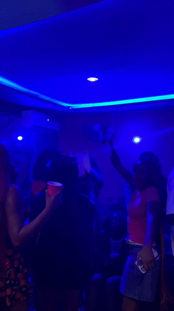Nightclub gathering with dancing and music in Durimi, Nigeria