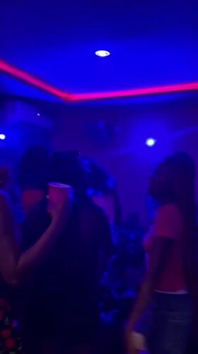 Nightclub gathering with dancing and music in Durimi, Nigeria